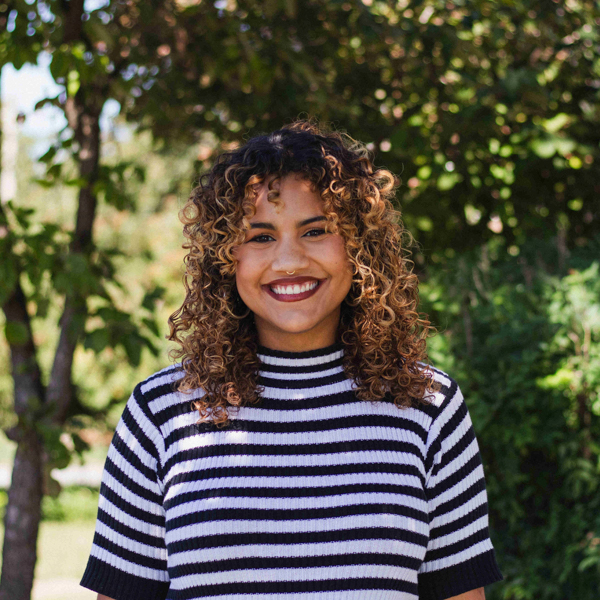 Clara Reyes Success Story Clara Reyes smiling in a professional headshot.
