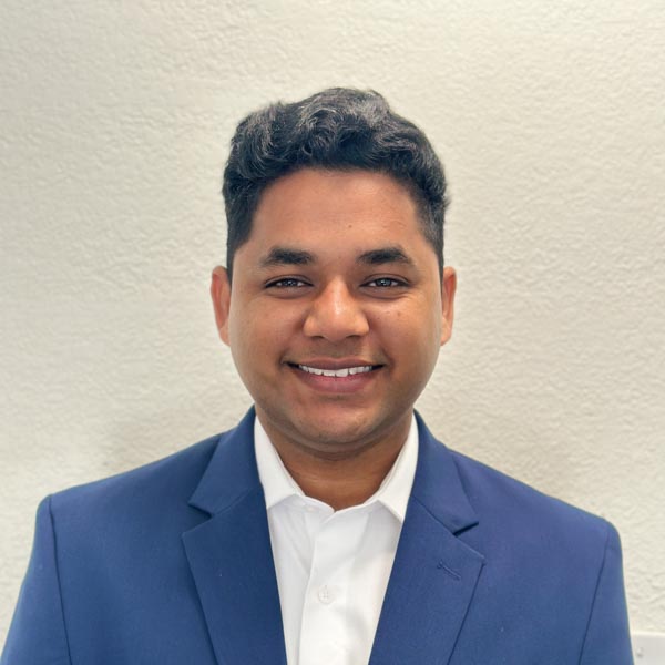 Jeevan Reddy Gujjula Success Story Jeevan Reddy Gujjula smiling in a professional headshot.