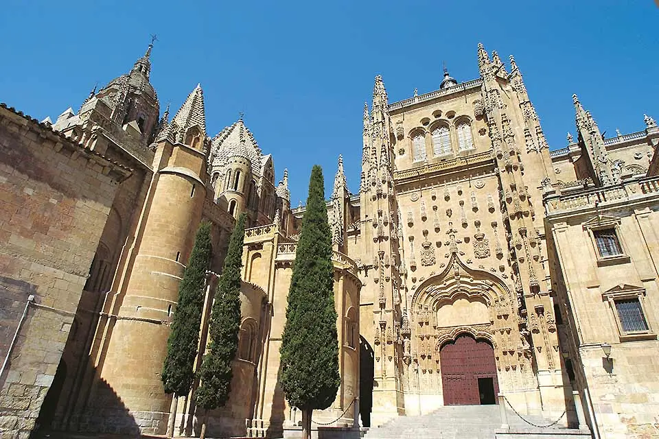 Exterior shot of Renaissance-era stone buildings with elaborate gothic facades.