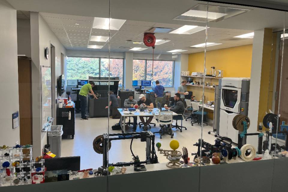 A view of the SLU-CAM lab space with members working within A view of the SLU-CAM lab space with members working within